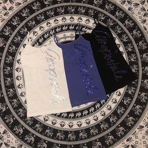 Three Aéropostale tank tops! White, Black, Purple.